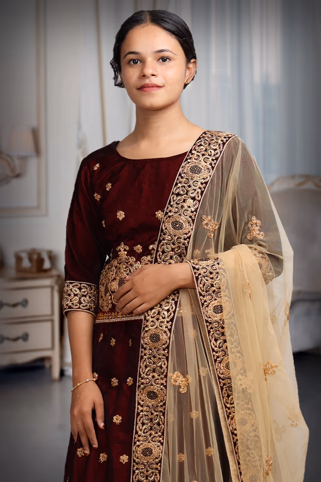 Maroon Pre Wedding Lehenga With Stone Work And Threadwork Details Along With Beige Color Dupatta — rent in Calicut