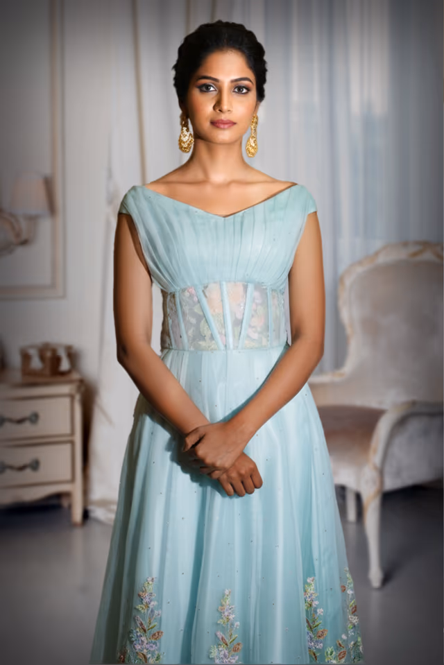Powder Blue Tulle Gown with Off-Shoulder Neckline and Floral Hem — rent in Kochi