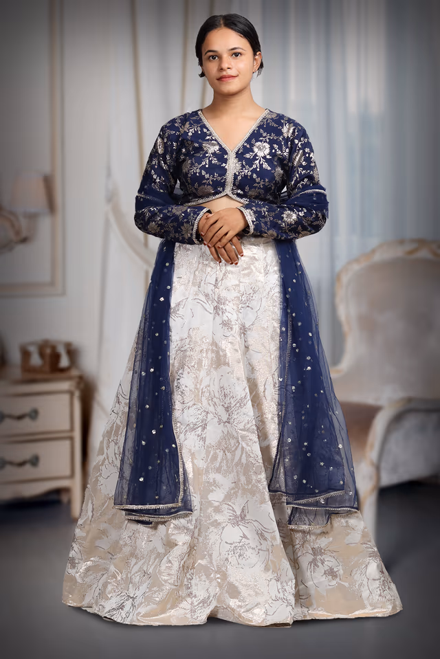 White And Blue Combination Brocade Lehenga With Golden Embellishment Details — back view, rent in Calicut
