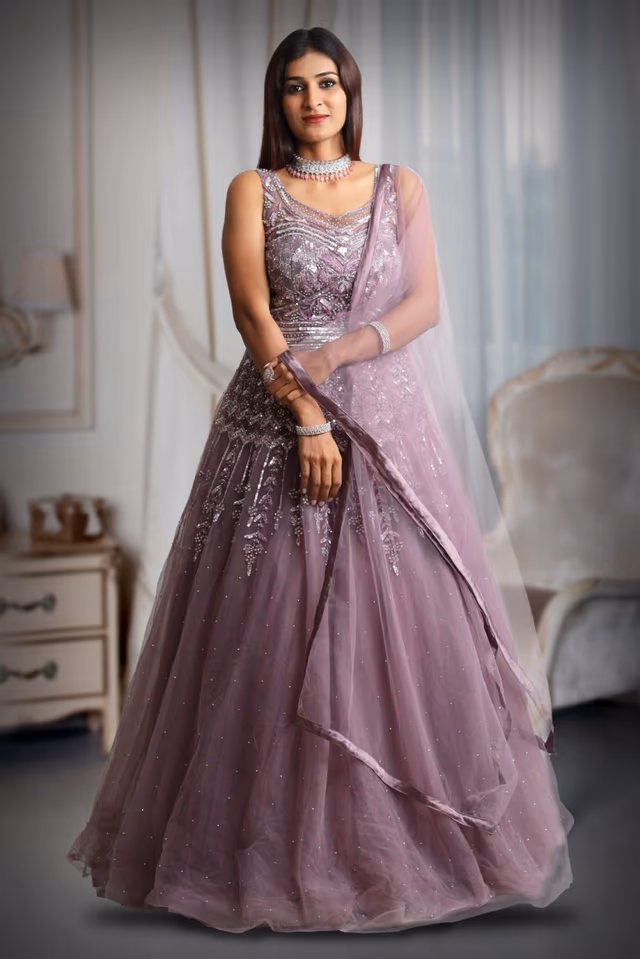 Dark mauve colour gown with heavy stone work as extension from the yoke — back view, rent in Bangalore