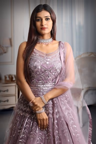 Dark mauve colour gown with heavy stone work as extension from the yoke — rent in Bangalore