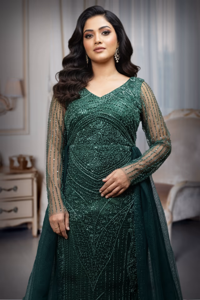 Deep Emerald Green Heavily Embellished Gown with Full Sleeves and Over-Skirt Detail — rent in Kochi