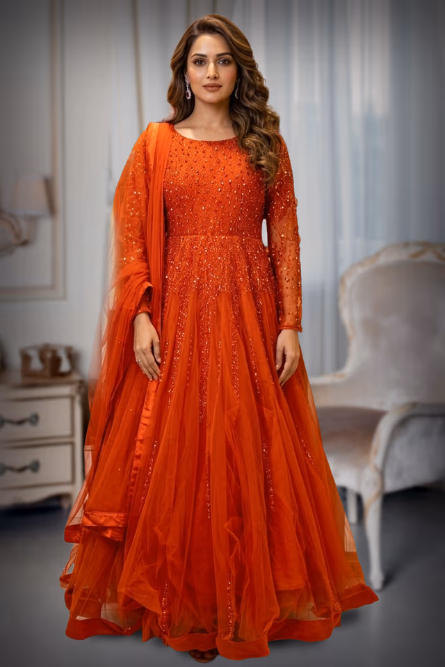 Graceful Dark Orange Gown Detailed With Delicate Floral Embroidery And Shimmering Accents — back view, rent in Calicut