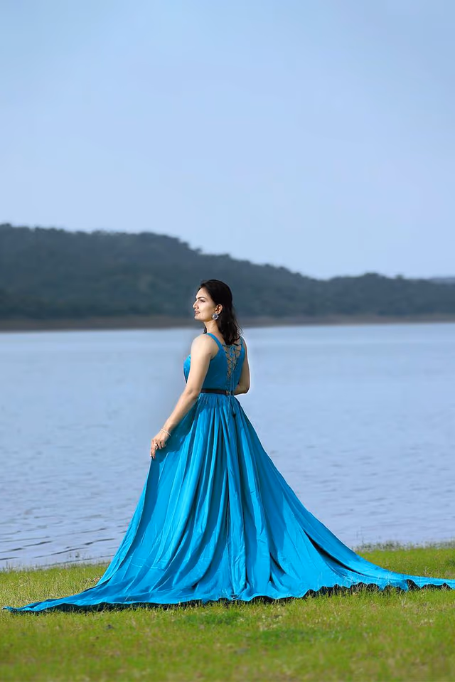 Iris Blue Sleeveless Gown with Three Panels Attached From the Waist area — back view, rent in Bangalore