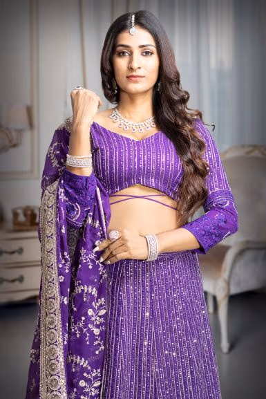 Iris Violet Heavy Embellished Lehenga With Threadwork and Sequin work With Deepcut Blouse with Midriff… — rent in Bangalore