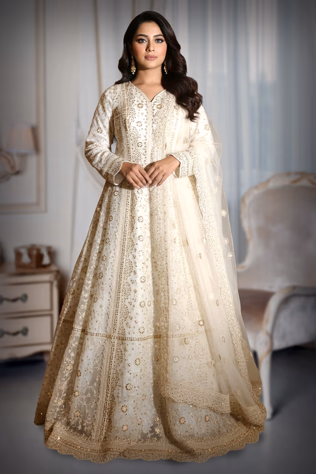 Elegant Ivory Anarkali Suit Adorned With Delicate Gold Mirror Work And Floral Motifs Paired… — back view, rent in Calicut
