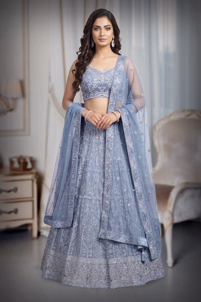Light Blue Net Lehenga With Ombre Shade Details Over Skirt With Crop Top And Same Color Dupatta — back view, rent in Kochi
