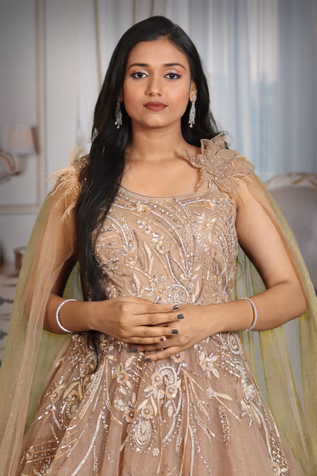 Light brown glitter net trail sleeve gown — view 1 of 5