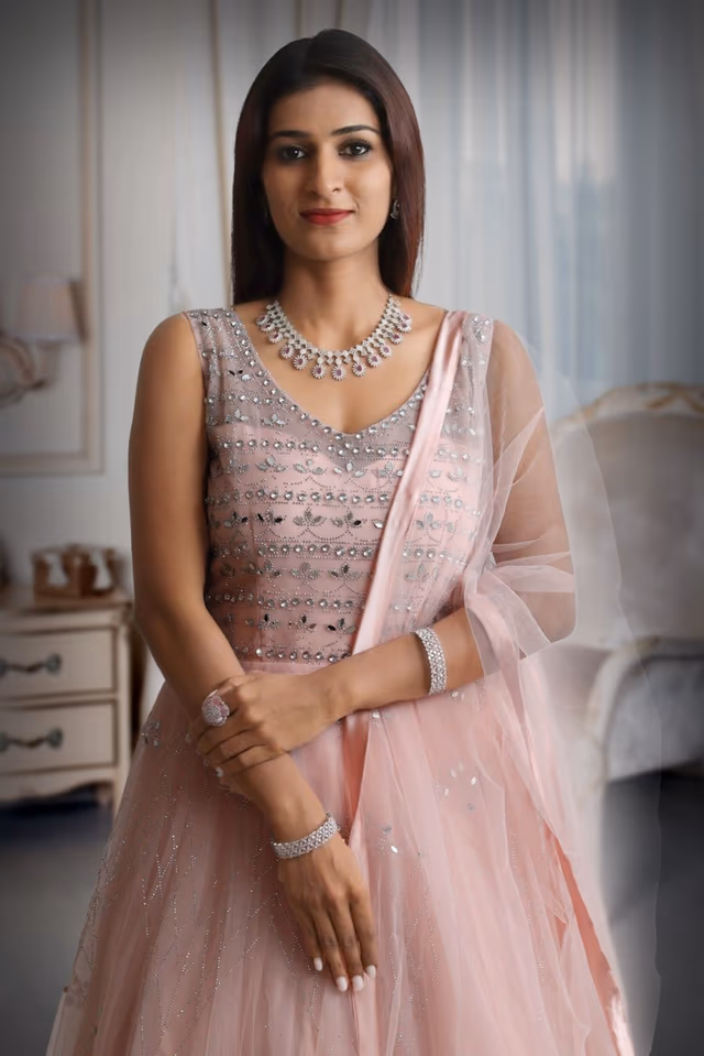 Light peach colour mirror work net sleeveless gown with dupatta — rent in Bangalore