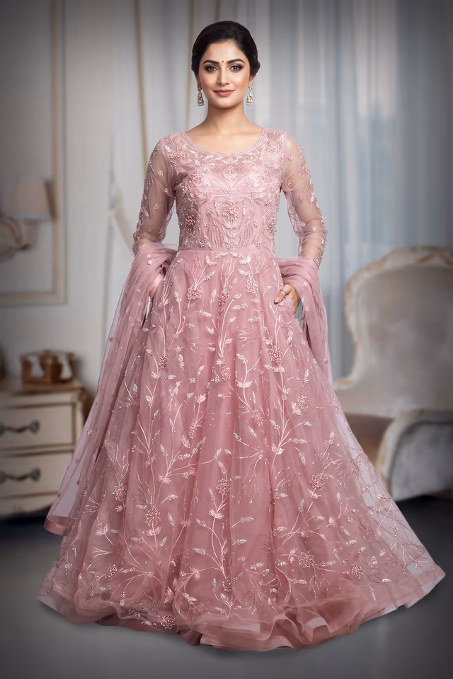 Light Pink Heavy Threadwork Embellished Bridal Gown  With Long Cape Sleeve — back view, rent in Kochi