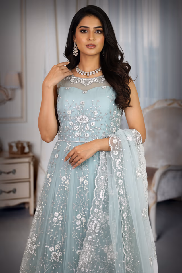 Pastel Aqua Blue Net Gown with Intricate Floral Embroidery — rent in Bangalore
