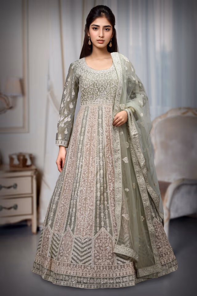 Pastel Green Heavy Embellished  Gown With Ivory And Pastel Green Intermixed texture With Beautiful… — rent in Coimbatore