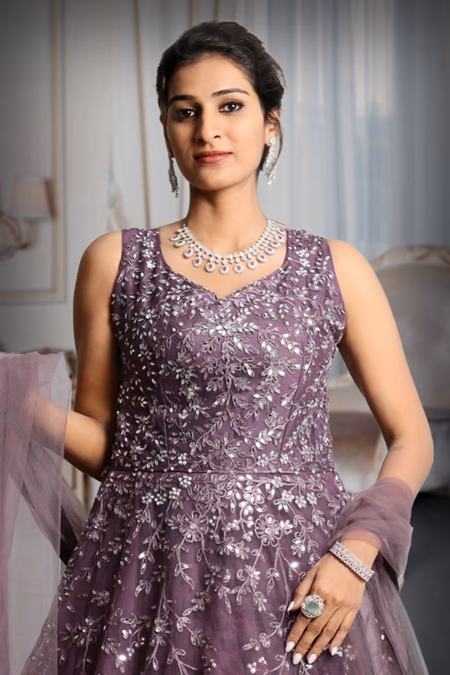 Purple Colour Heavy Stone work Net Sleeveless Gown With Exquisite Detailing — rent in Coimbatore