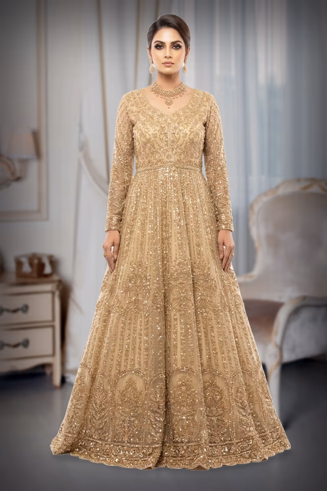 Elegant Sand Beige Anarkali Lehenga Adorned With Delicate Gold Mirror Work And Floral Motifs Paired With… — rent in Calicut
