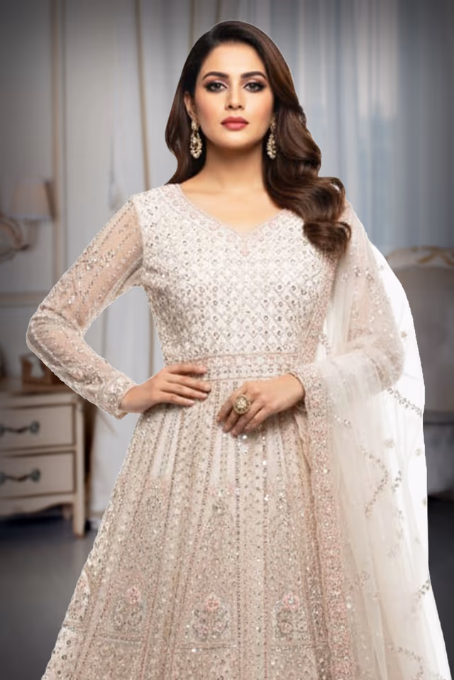 White Anarkali Features Intricate Sequin Embellishments Detailed Embroidery And A Matching Sheer Net… — rent in Calicut