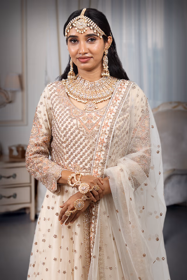 Heavy Worked Off White Bridal Gown With Stone Work Embellishment — rent in Calicut
