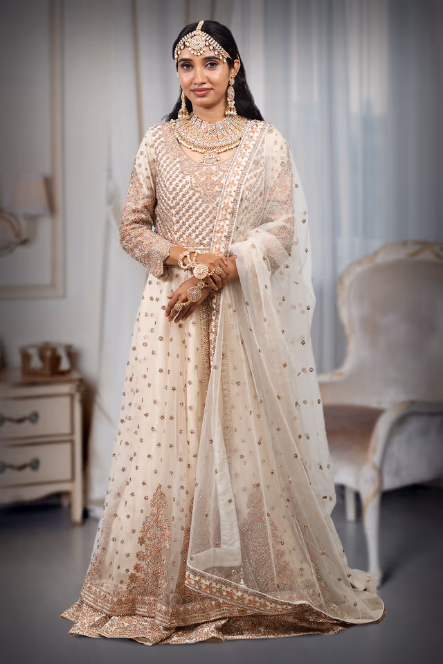 Heavy Worked Off White Bridal Gown With Stone Work Embellishment — back view, rent in Calicut