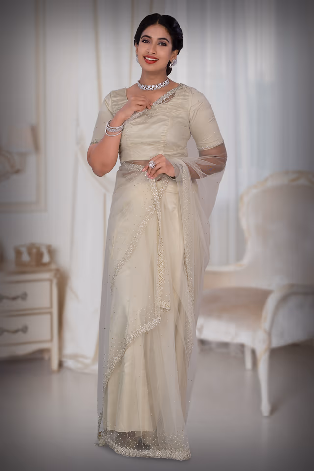 Off White Net  Saree — back view, rent in Calicut