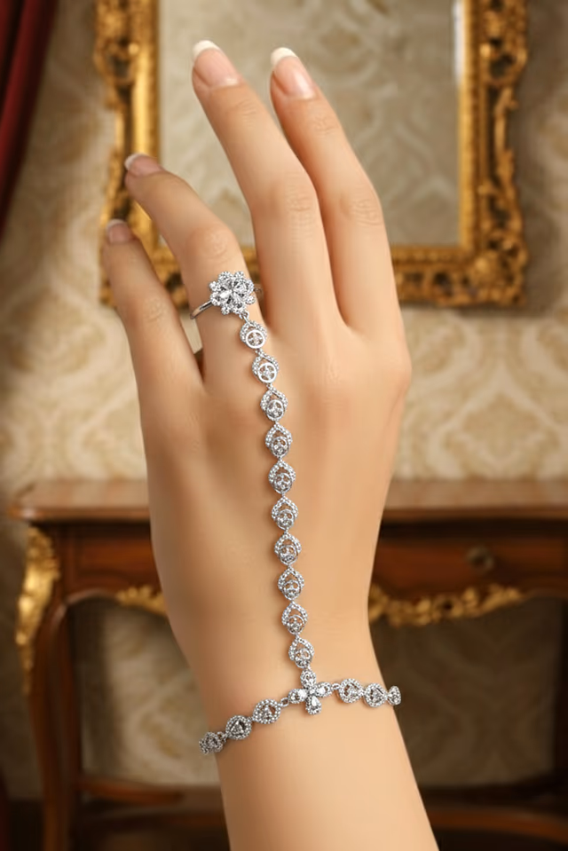 Luxurious AD Stone Ring Bracelet With Intricate Tear Drop Pattern Stone Embellishment — rent in Calicut