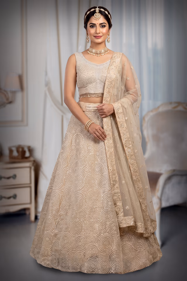 Pearl White Heavy Bridal Lehenga With Stone Work And Pearl Detaii Embellishment — back view, rent in Calicut