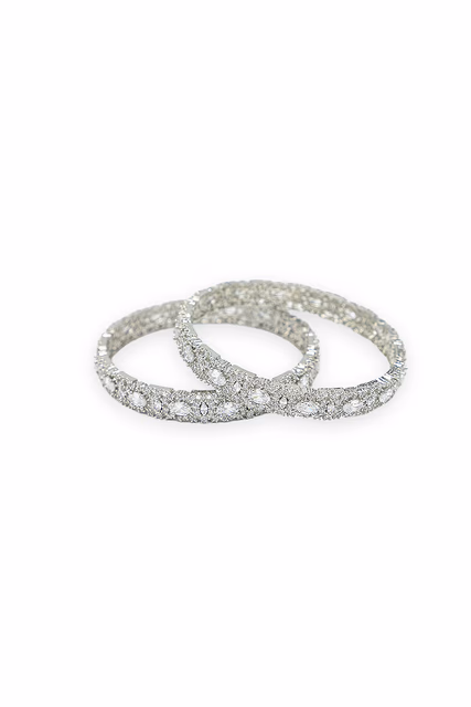 Add Sparkle To Your Wrist With These Beautiful White Stone Bangles Featuring A Bright Silver Polish — rent in Calicut