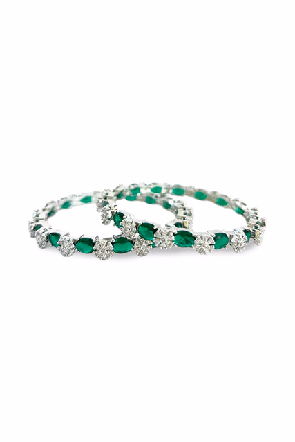 Discover The Perfect Blend Of Style And Grace With These Magnificent Green Stone Studded Bangles — rent in Bangalore