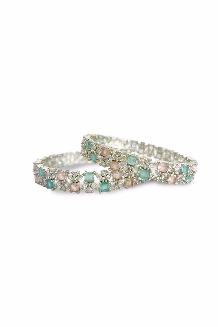 Exquisite Jewelry Pieces Feature A Classic Design With Alternating Pink And Green Sparkling Stones — rent in Bangalore