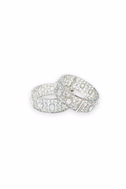 Stunning Silver Finished Bangles Showcase Lush White Oval Stones Set In Brilliant And Sparkling Crystals — rent in Calicut