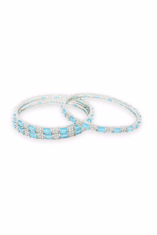 High Quality Silver Bangles Showcasing Vibrant Blue Accents Surrounded By Dazzling Clear And Sparkling… — rent in Calicut