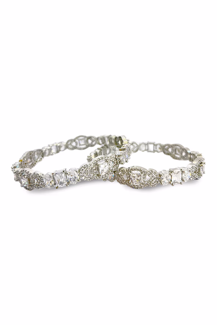 Timeless Silver Bangles Featuring A Delicate Pattern Of Brilliant White Synthetic Gemstones — rent in Bangalore