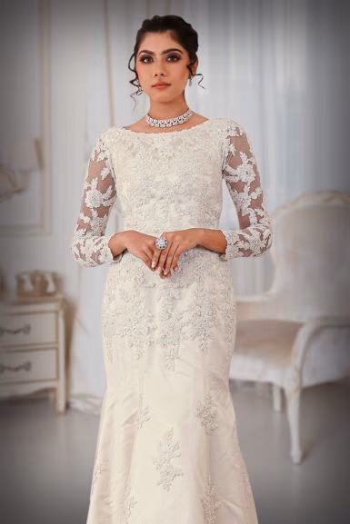 Corded lace and cutbead work in Mermaid dark ivory  gown — rent in Calicut