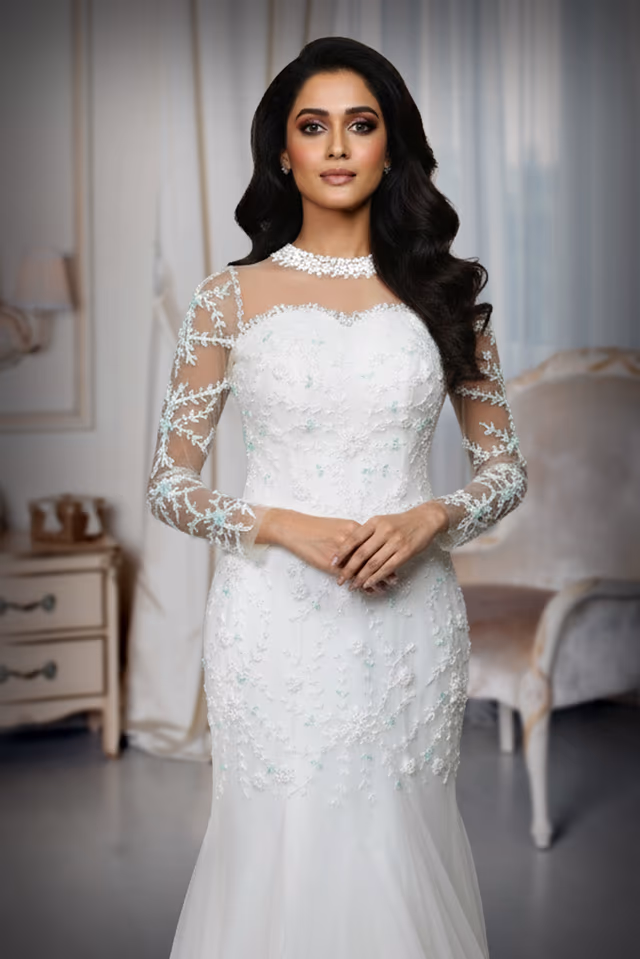 Elegant White Illusion Neckline Mermaid Gown with Floral Lace Appliqués and Tulle Train — rent in Kochi