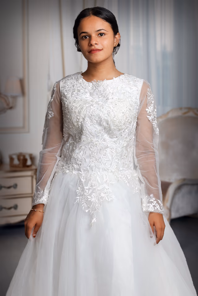 White Bridal Gown With Heavy Lacework Details On Front And Back Yoke Along With Sleeves — rent in Calicut