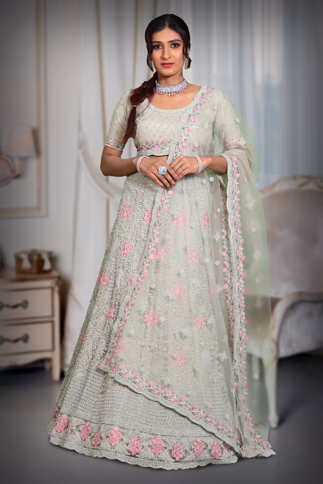 Pista Green jarkan stone work lehenga — back view, rent in Bangalore
