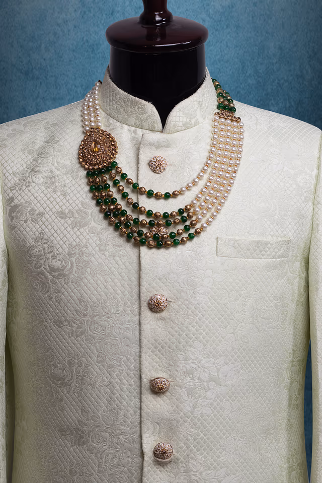 Ivory White And Bottle Green Five Layered Mothi Mala With Heavy Detailed Raindrop Traditional Locket On… — rent in Calicut