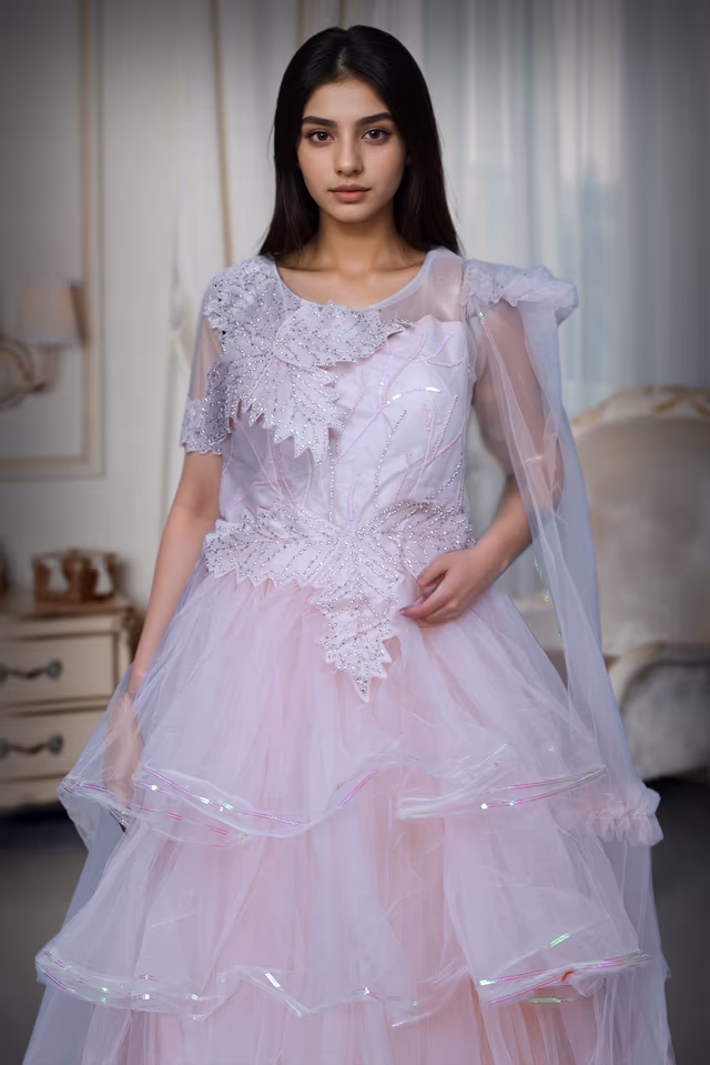 Pastel Peach Layered Net Gown With Detailed Work In Yoke Part — rent in Coimbatore