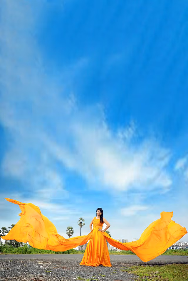 Golden Yellow Sleeveless Satin Gown With Double Panel Tails — back view, rent in Bangalore