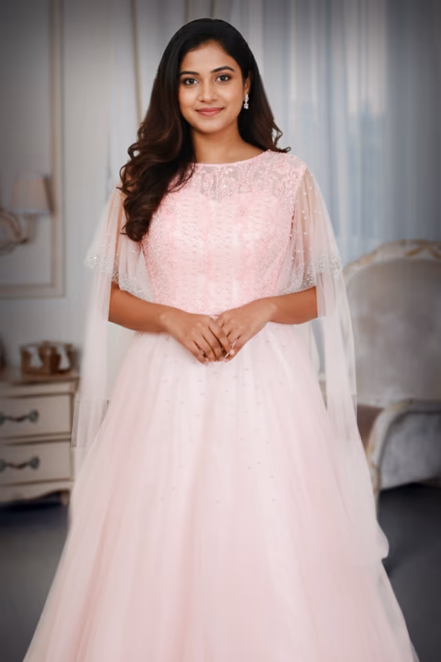 Soft Pink Gown Features Beads Details, Creating A Graceful And Luxurious Appearance — rent in Calicut