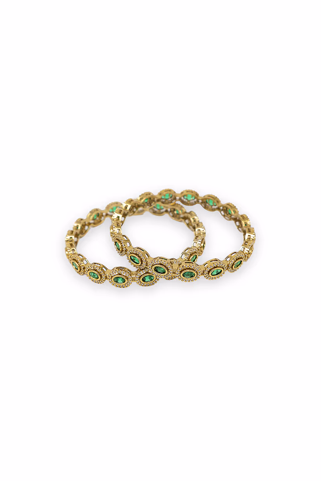 Exquisite Gold Toned Green Bangles Featuring Beautiful Circular Floral Clusters And Brilliant Clear Stone… — rent in Calicut