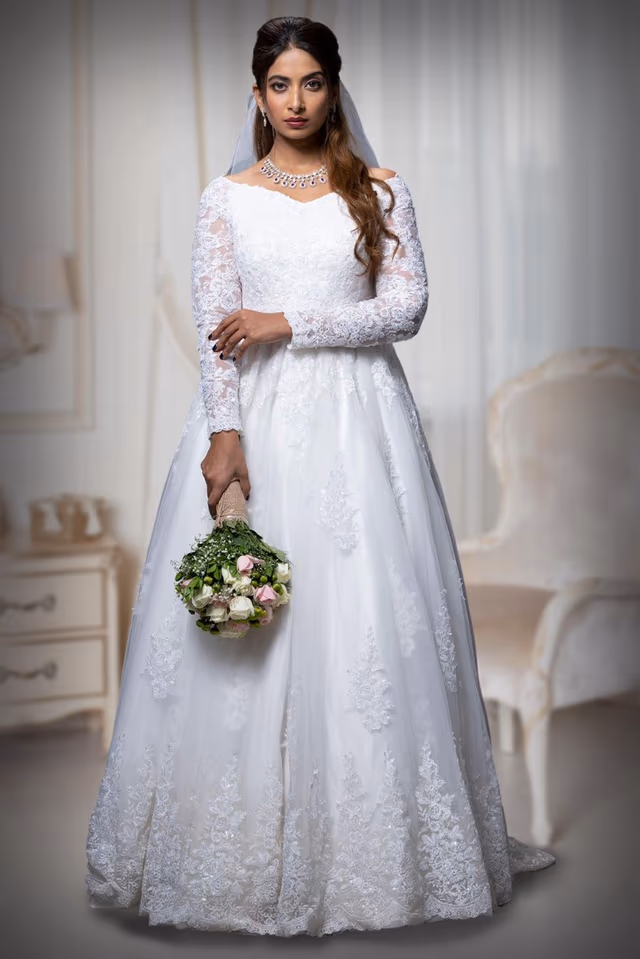 Light ivory  ball Gown — back view, rent in Calicut